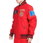 Model wearing San Francisco 49ers Crest Varsity Jacket front view.