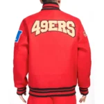 Model wearing San Francisco 49ers Crest Varsity Jacket front view.