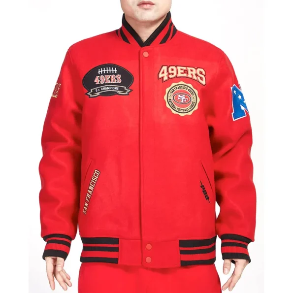 Model wearing San Francisco 49ers Crest Varsity Jacket front view.