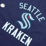 Model front view wearing Seattle Kraken Tailback Varsity Jacket.