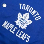 Model front view wearing Toronto Maple Leafs Varsity Jacket.