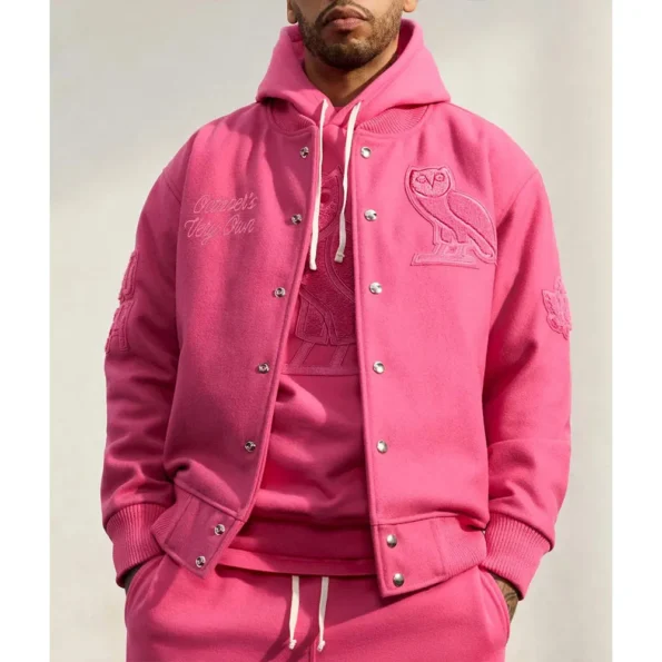 Model wearing Valentine OVO Pink Varsity Jacket front