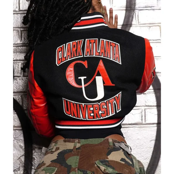 Model wearing Clark Atlanta University Varsity Jacket back view.