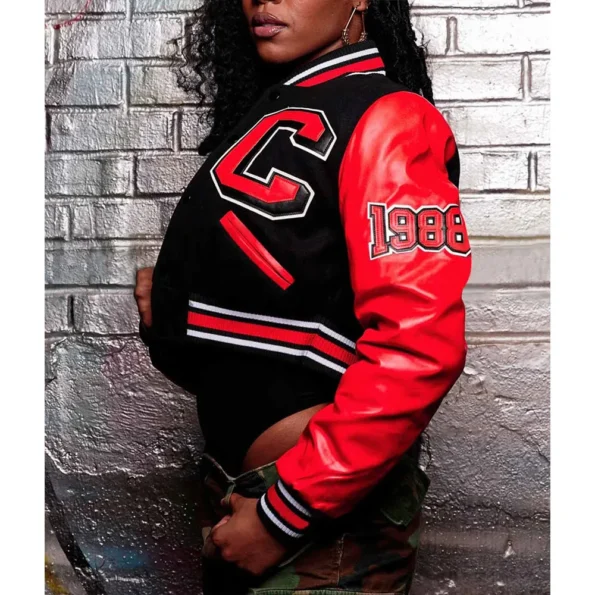 Model wearing Clark Atlanta University Varsity Jacket side view.