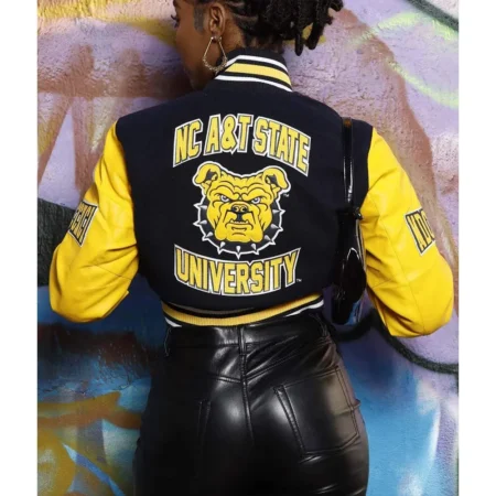 Model wearing North AT State University Varsity Jacket back view.