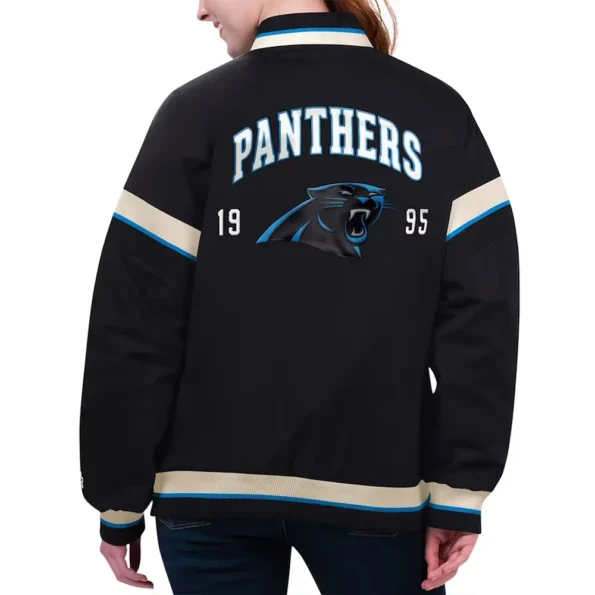 Model wearing Carolina Panthers Black Varsity Jacket back