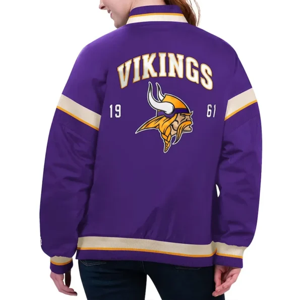 Model wearing Minnesota Vikings Purple Varsity Jacket back