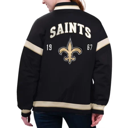 Model wearing New Orleans Saints Black Varsity Jacket back