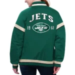 Model in NY Jets Tournament Green Varsity Jacket Front