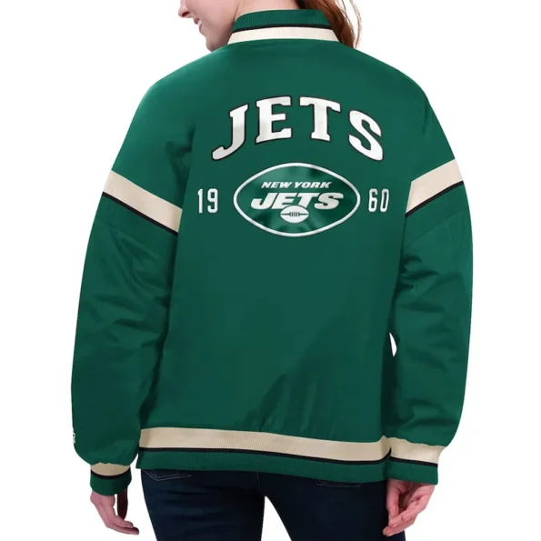 Model wearing NY Jets Tournament Green Varsity Jacket back