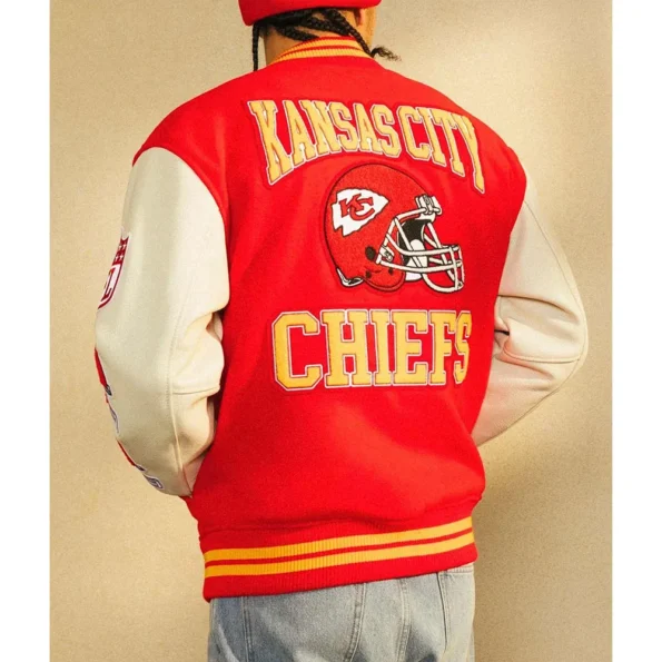 Model wearing OVO Kansas City Chiefs Varsity Jacket back view