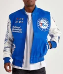 Model wearing Mash Up Philadelphia 76ers Varsity Jacket front view