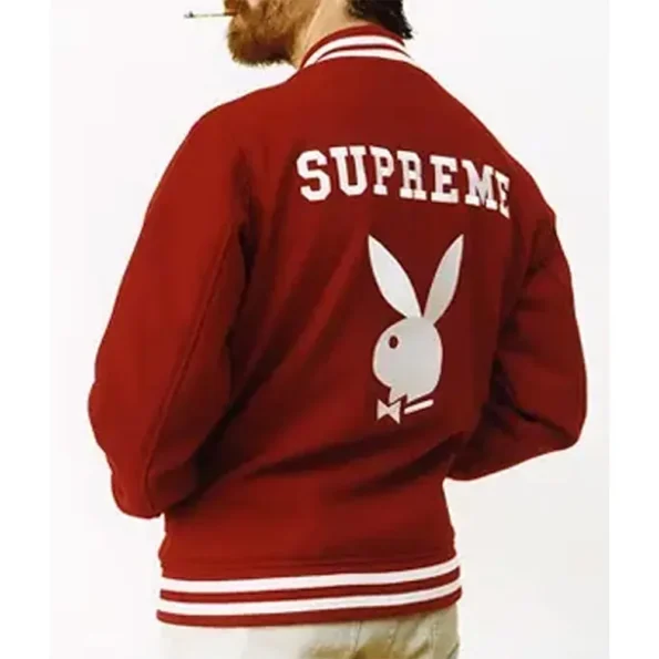 Side view of model in Supreme Playboy Varsity Wool Jacket