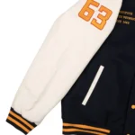 Model in Xavier Institute Black Varsity Jacket Front