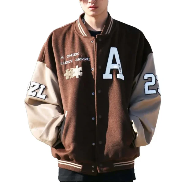 Model wearing Achock Brown Varsity Jacket front view