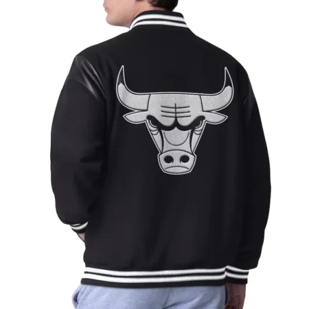 Back view of model in Chicago Bulls Clutch Varsity Jacket