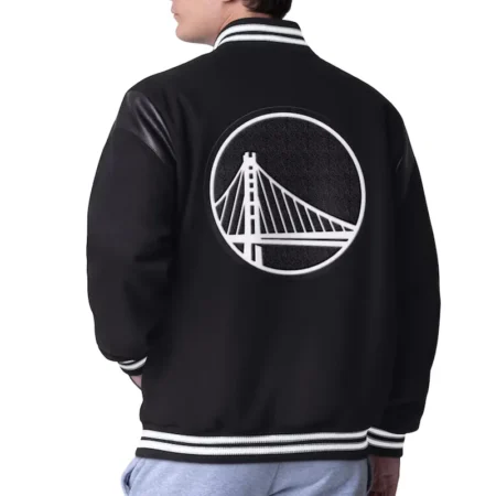 Back view of model in Golden State Warriors Clutch Varsity Jacket