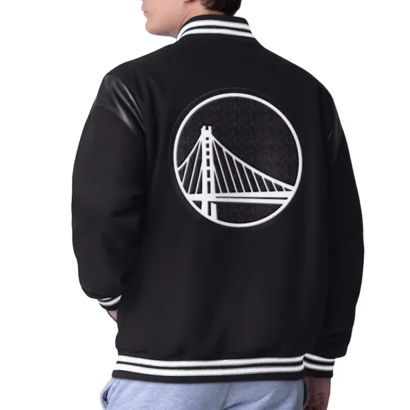 Back view of model in Golden State Warriors Clutch Varsity Jacket