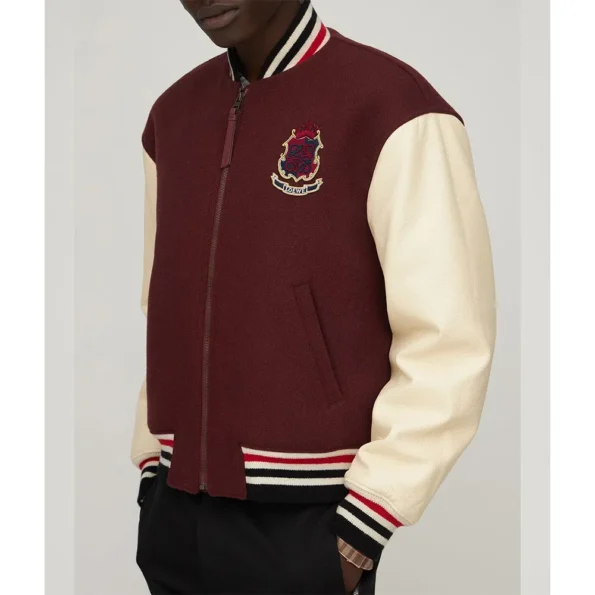 Side view of Marcus Scribner in Grown-Ish Varsity Jacket