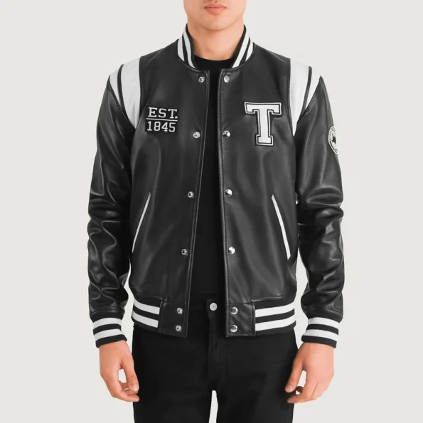 Model wearing Liberte Texas Black Varsity Jacket front view