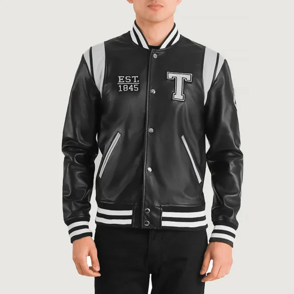 Model wearing Liberte Texas Black Varsity Jacket front view