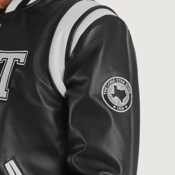 Close-up of Liberte Texas Black Varsity Jacket details