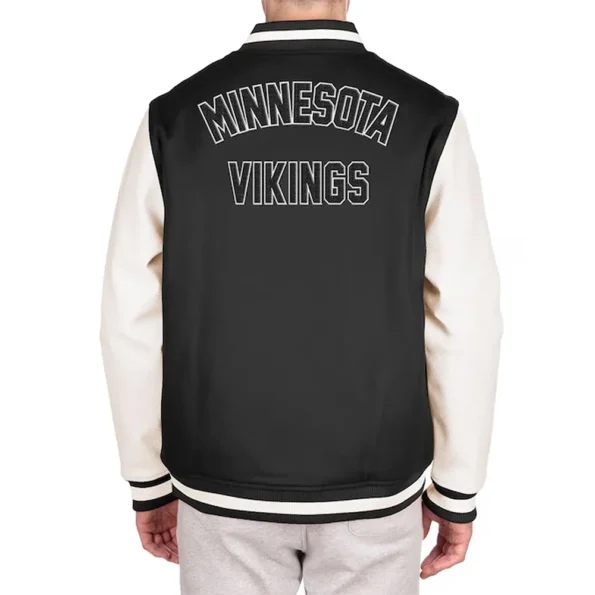 Model wearing Minnesota Vikings Varsity Jacket back view