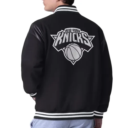 Back view of model in NY Knicks Clutch Hitter Varsity Jacket