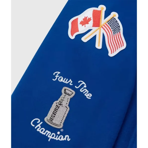 Close-up of OVO New York Rangers Varsity Jacket logo and details