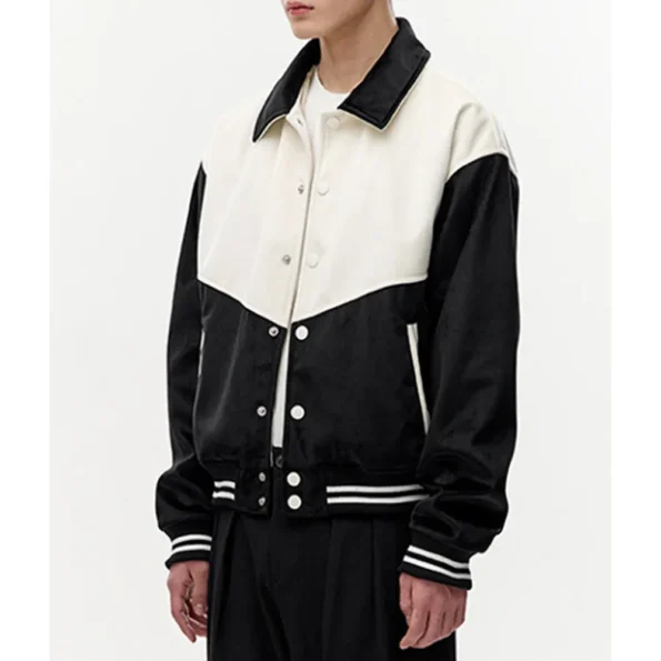 Side view of model in Western Black and White Varsity Jacket