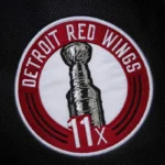 Front view Detroit Red Wings black varsity jacket photo.