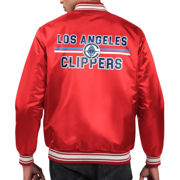 Model wearing LA Clippers printed team varsity jacket back view.