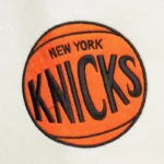 Front view NY Knicks team history varsity jacket photo.