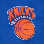 Front view NY Knicks team history varsity jacket photo.