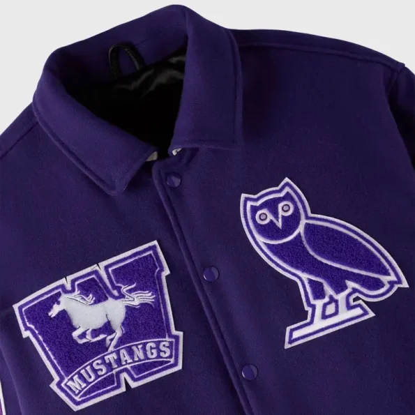 Close-up details of OVO Western Mustangs Varsity Jacket