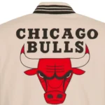 Front view Chicago Bulls cream varsity jacket photo.