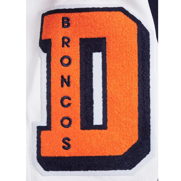 Close-up of Denver Broncos mashup rib varsity jacket embroidery.