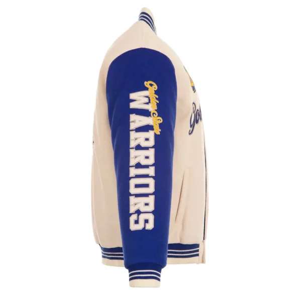 Side view of Golden State Warriors cream varsity jacket.