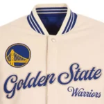 Front view Golden State Warriors cream varsity jacket photo.