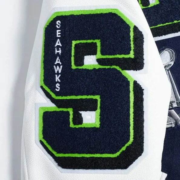 Close-up of Seattle Seahawks mashup varsity jacket embroidery.