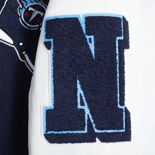 Close-up of Tennessee Titans mashup varsity jacket embroidery.